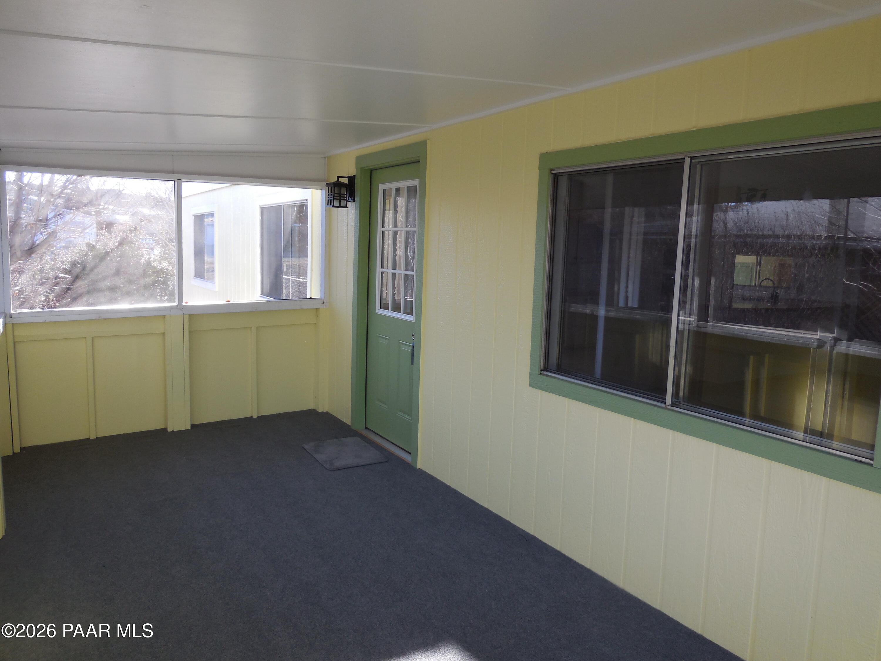 1145 Trinity Court Prescott, AZ 86301 - Photo 4 of 23 a view of an empty room with a window