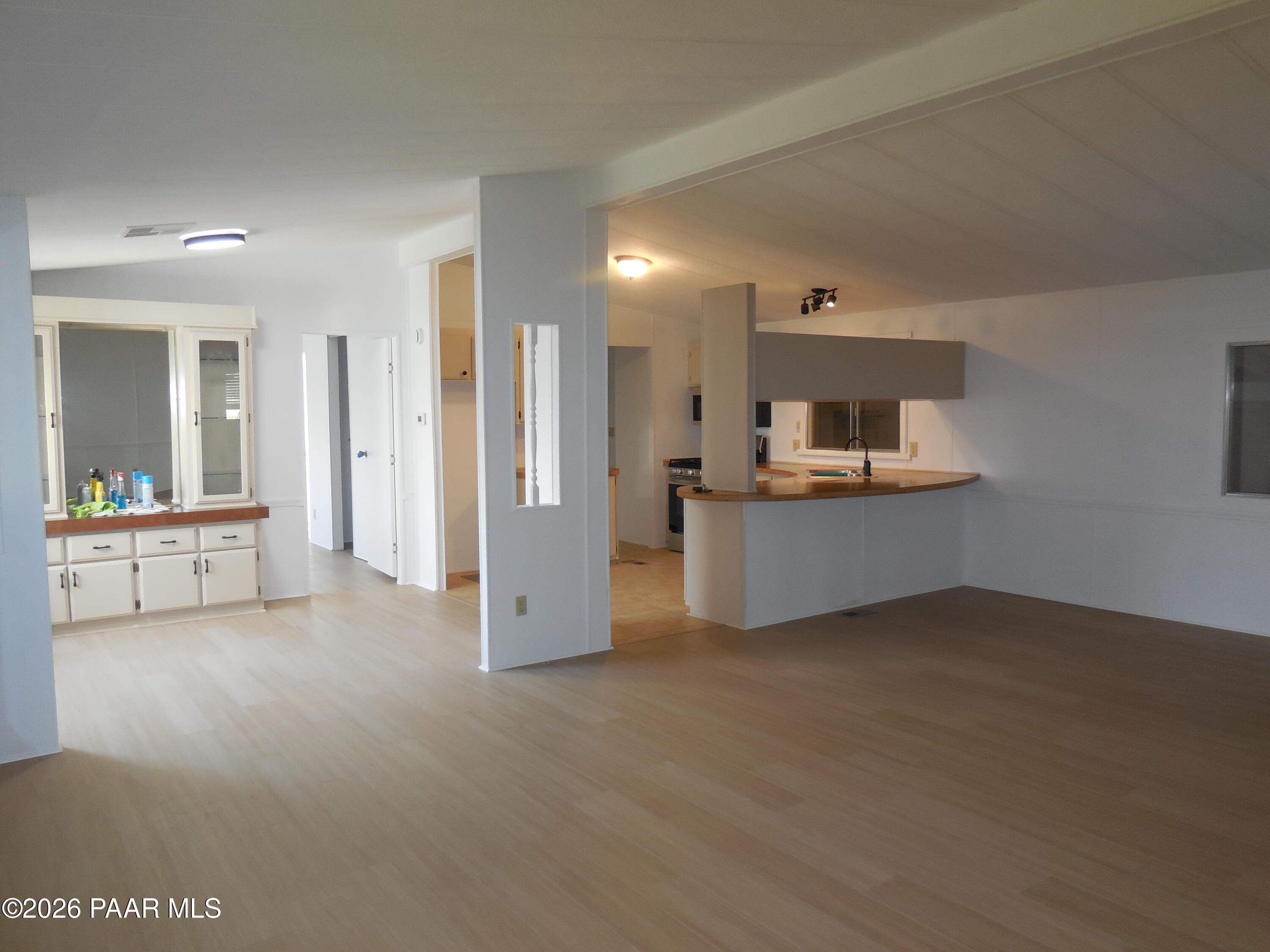 1145 Trinity Court Prescott, AZ 86301 - Photo 7 of 23 a view of a kitchen with a sink and a cabinet