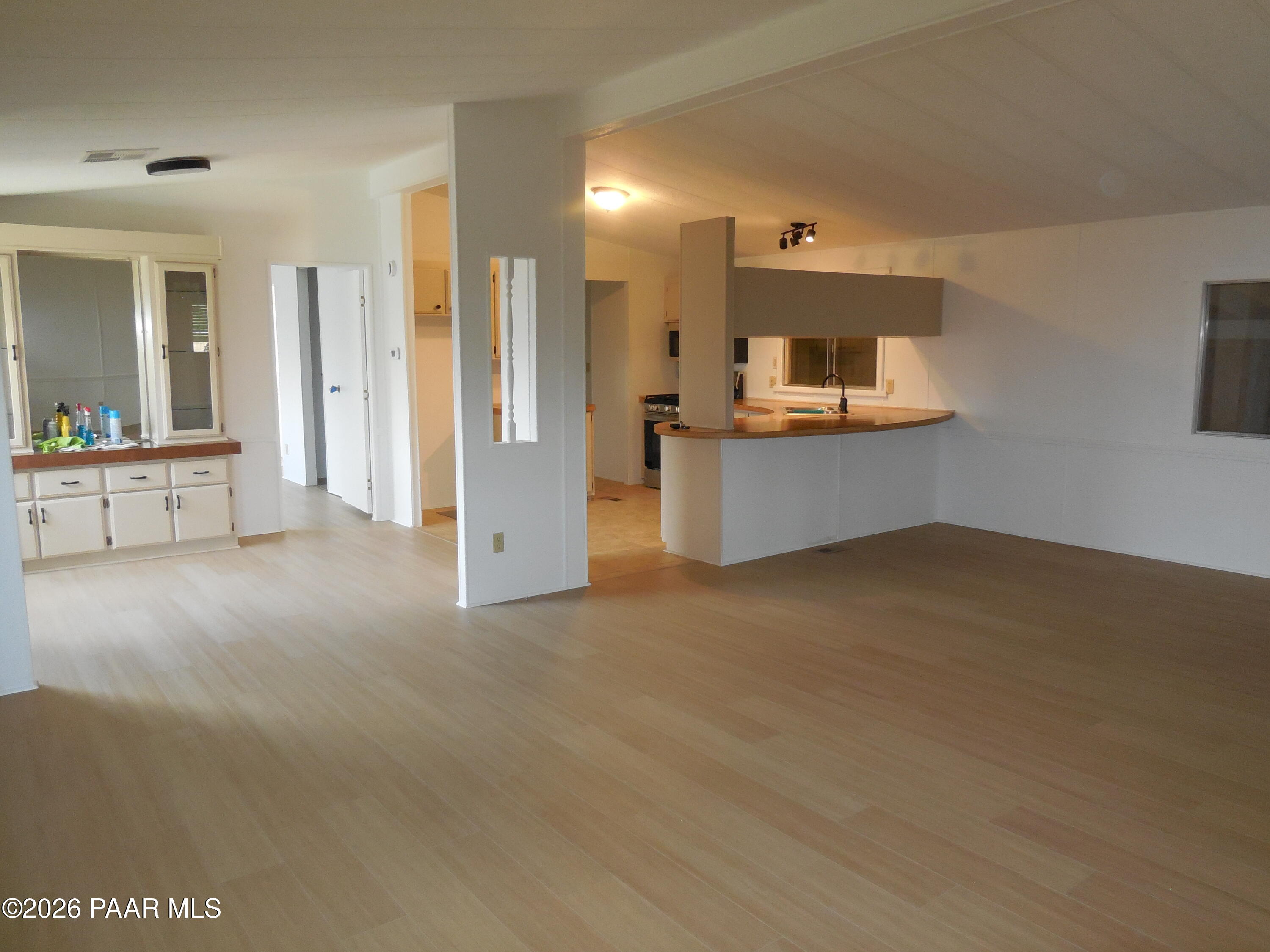 1145 Trinity Court Prescott, AZ 86301 - Photo 10 of 23 a living room with furniture and a wooden floor