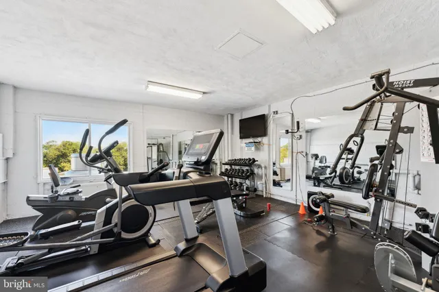 a view of a room with gym equipment