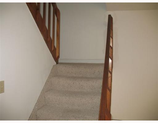 601 Springdale Circle Palm Springs, FL 33461 - Photo 8 of 14 a view of a hallway with stairs