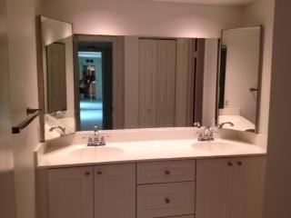 601 Springdale Circle Palm Springs, FL 33461 - Photo 9 of 14 a bathroom with a sink and a mirror