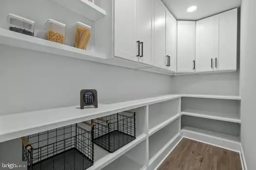 a view of cabinets and window