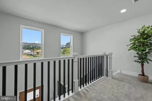 a view of hallway with a window