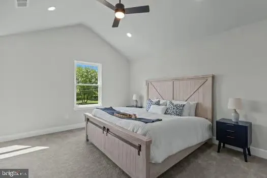 a bed room with a bed and a window