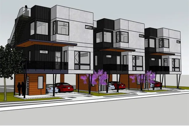 a view of a brick building with large windows