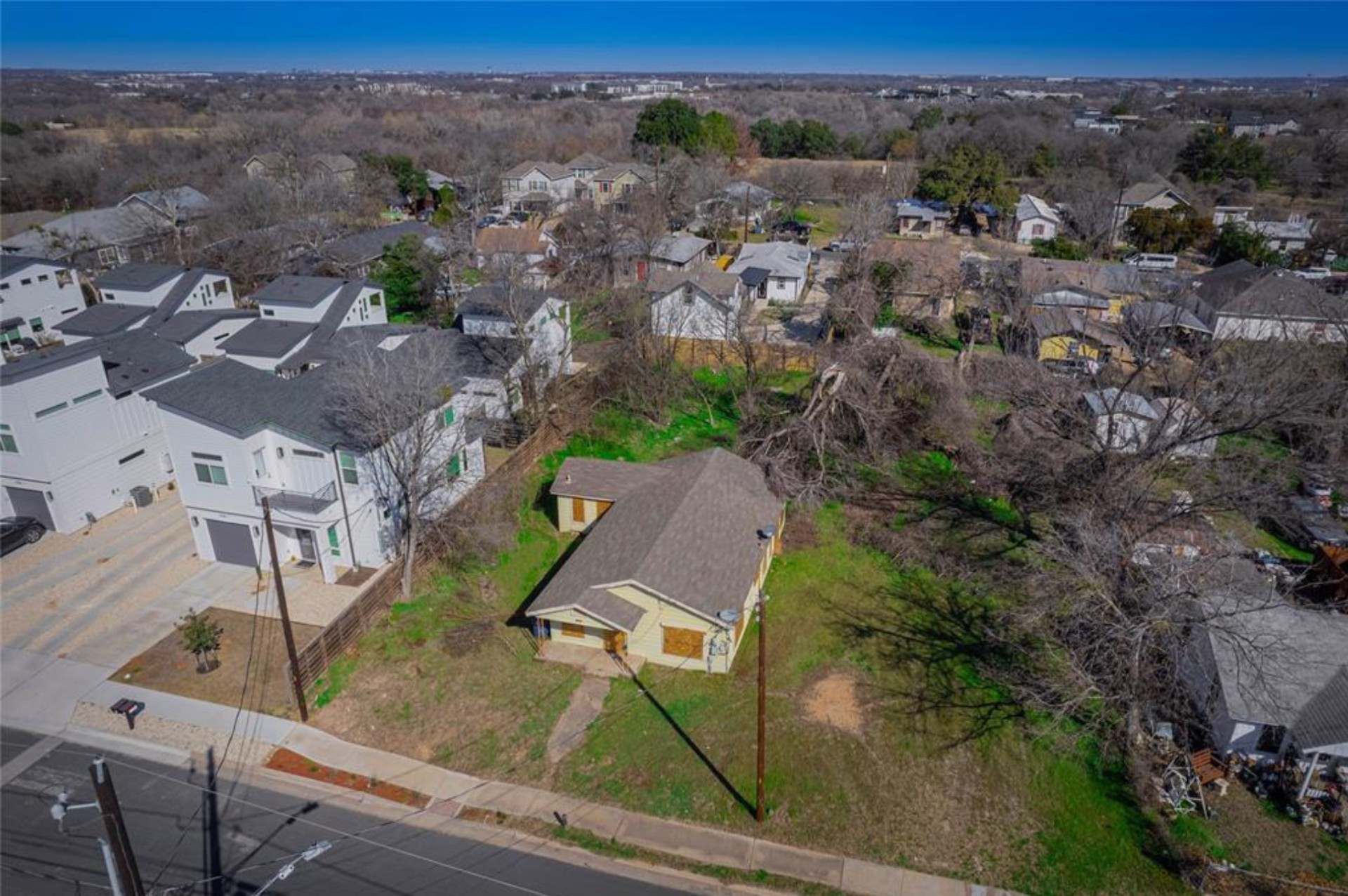 6106 Ponca Street Austin, TX 78741 - Photo 4 of 6 an aerial view of a house with a mountain