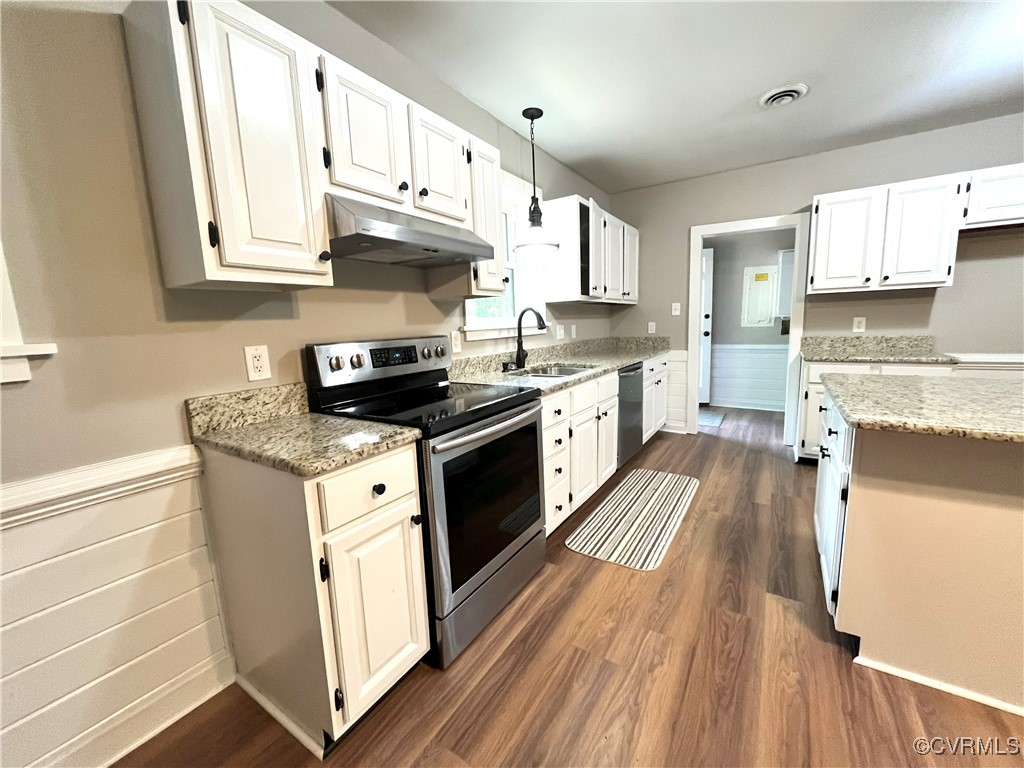 12027 Old Buckingham Road Midlothian, VA 23113 - Photo 15 of 40 a kitchen with stainless steel appliances granite countertop a stove a sink dishwasher and a refrigerator