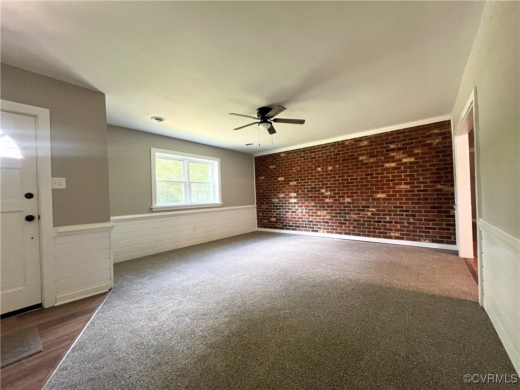 12027 Old Buckingham Road Midlothian, VA 23113 - Photo 19 of 40 a view of an empty room with a window