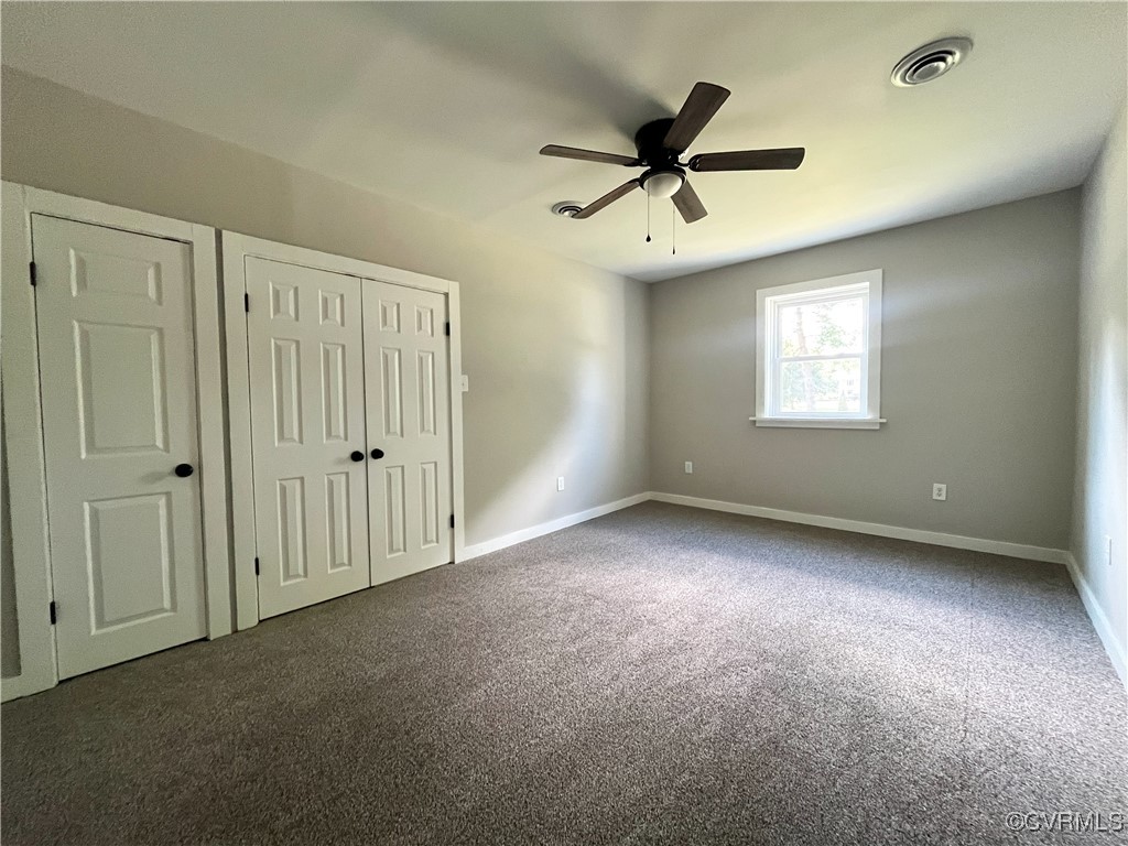 12027 Old Buckingham Road Midlothian, VA 23113 - Photo 20 of 40 an empty room with windows and closet
