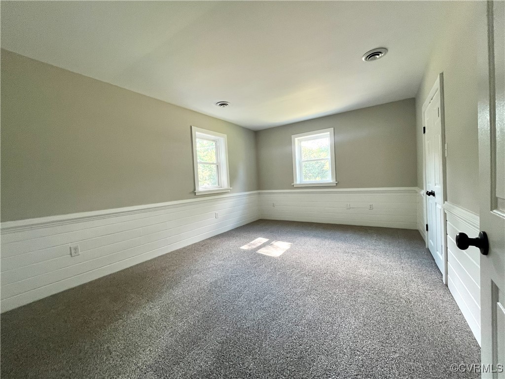 12027 Old Buckingham Road Midlothian, VA 23113 - Photo 23 of 40 an empty room with windows