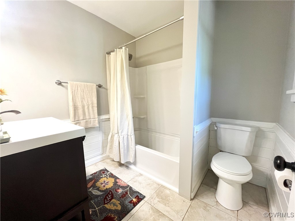 12027 Old Buckingham Road Midlothian, VA 23113 - Photo 25 of 40 a bathroom with a sink toilet and shower