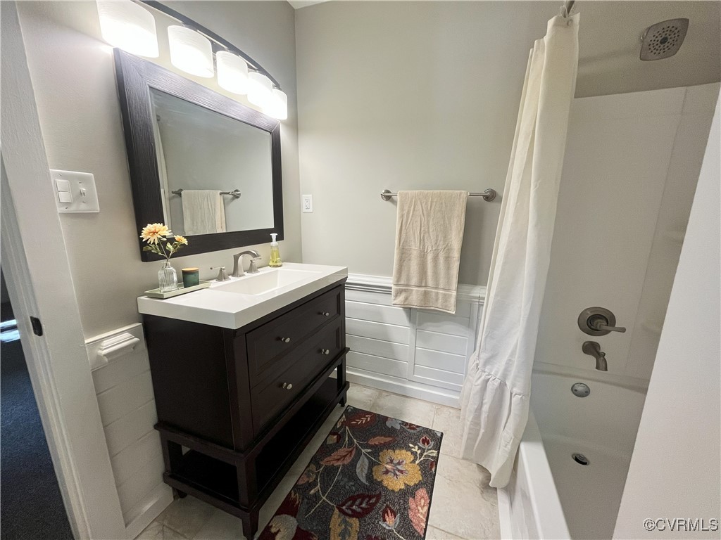 12027 Old Buckingham Road Midlothian, VA 23113 - Photo 26 of 40 a bathroom with a sink vanity and mirror