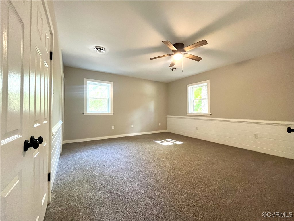 12027 Old Buckingham Road Midlothian, VA 23113 - Photo 29 of 40 a view of an empty room with a window