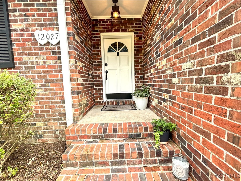 12027 Old Buckingham Road Midlothian, VA 23113 - Photo 3 of 40 a view of a balcony with a door