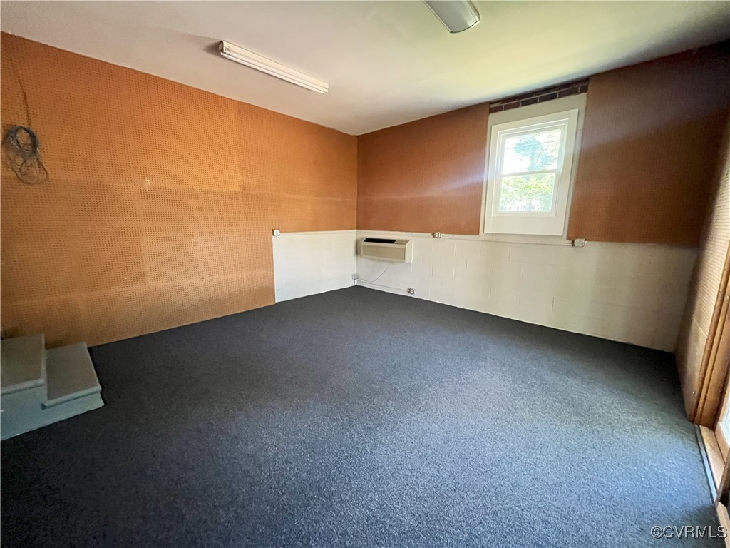 12027 Old Buckingham Road Midlothian, VA 23113 - Photo 32 of 40 an empty room with windows