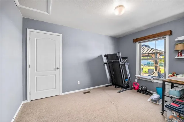 a view of house with swimming pool outdoor seating