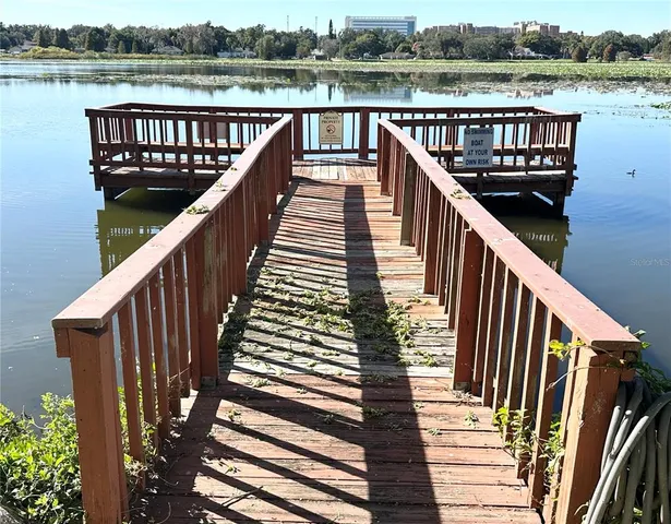a view of a lake with a yard