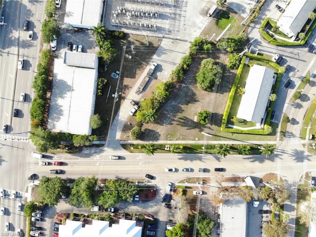 1202 5th Avenue North Naples, FL 34102 - Photo 2 of 4 an aerial view of residential houses with outdoor space