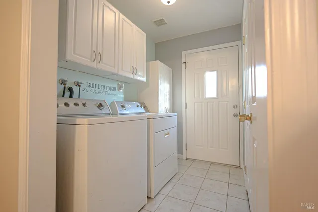 a bathroom with a toilet sink and a mirror