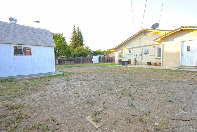 a view of outdoor sitting area with furniture