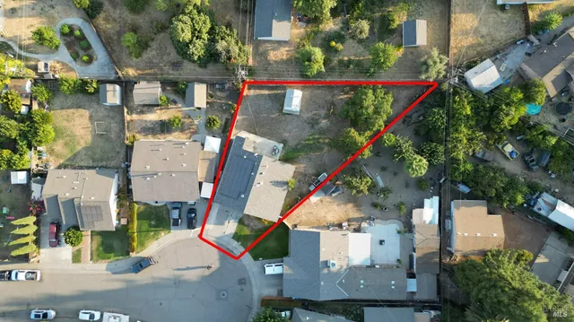 an aerial view of buildings and roads