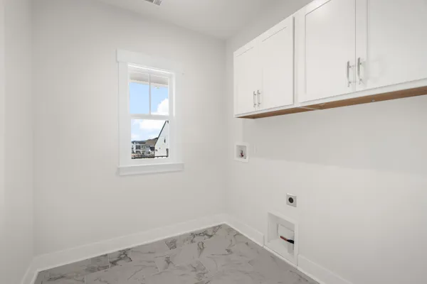 an empty room with cabinet