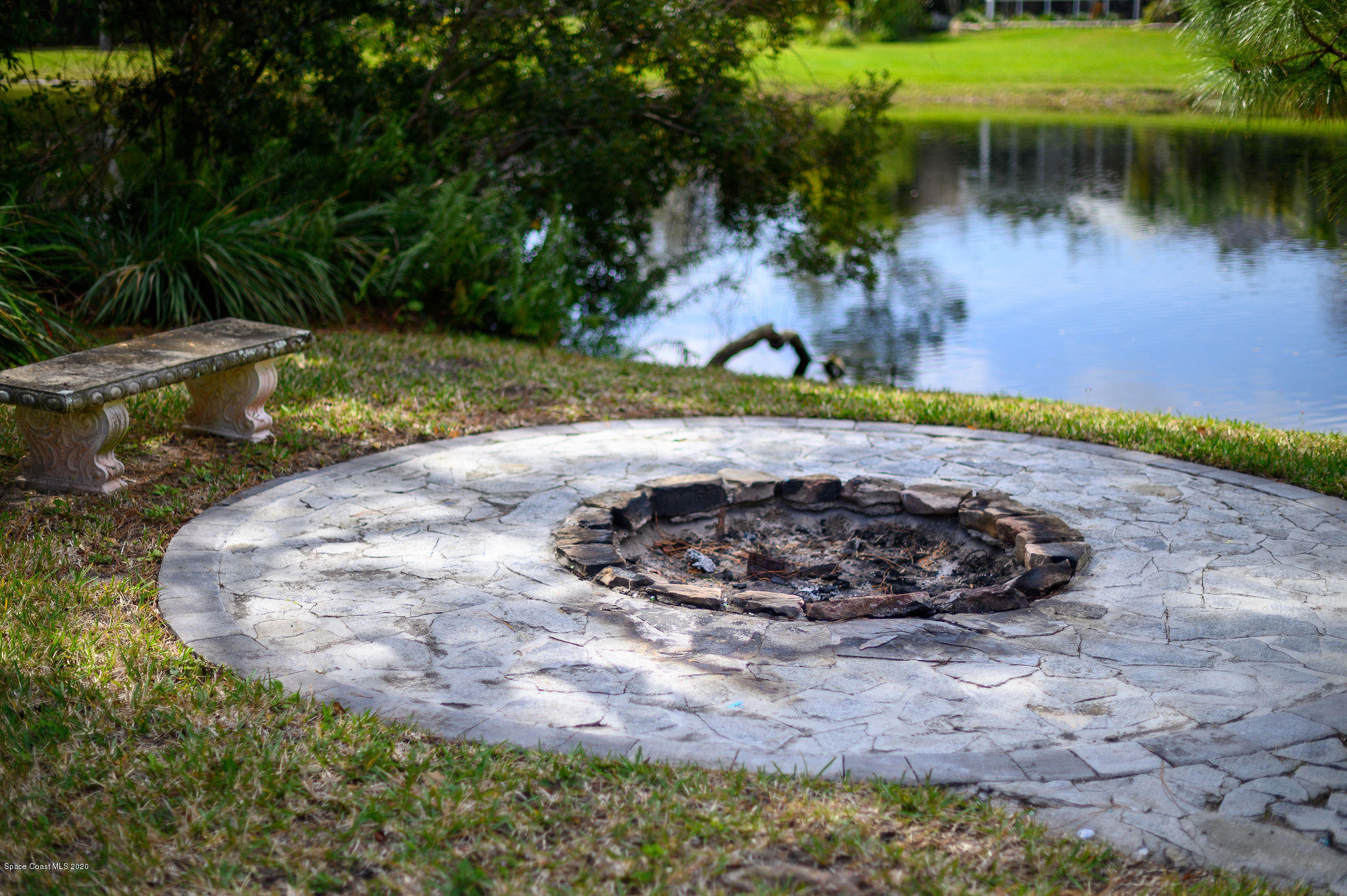 4434 Long Lake Road Melbourne, FL 32934 - Photo 41 of 53 Firepit by water