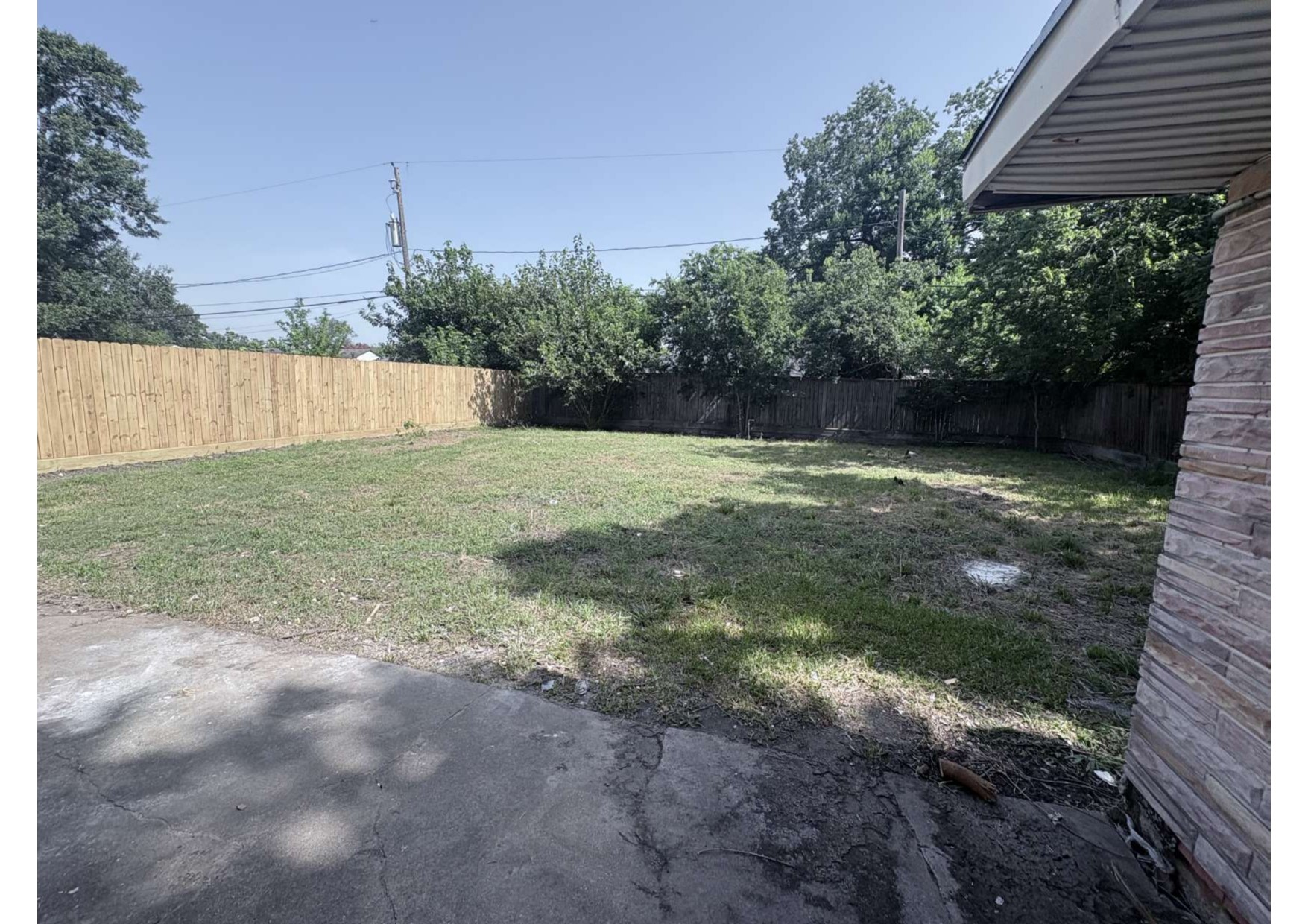 5923 Van Fleet Street Houston, TX 77033 - Photo 5 of 23 a view of a yard with plants and trees