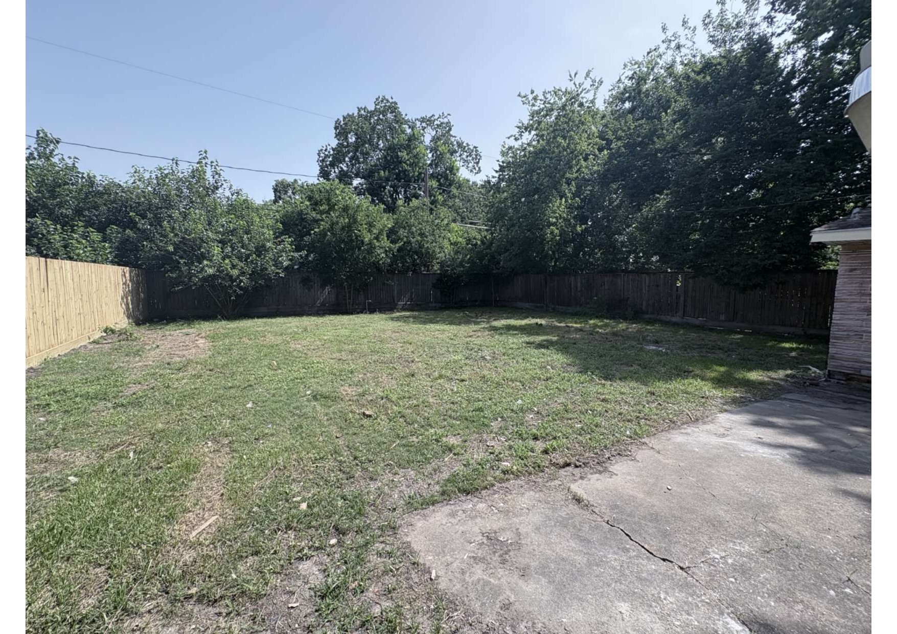 5923 Van Fleet Street Houston, TX 77033 - Photo 6 of 23 a view of patio with a yard