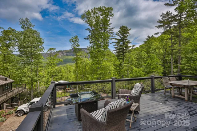 a view of a balcony with chairs
