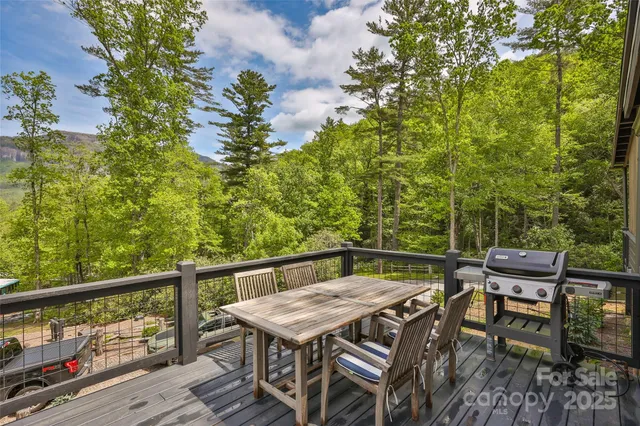 a view of a balcony with furniture