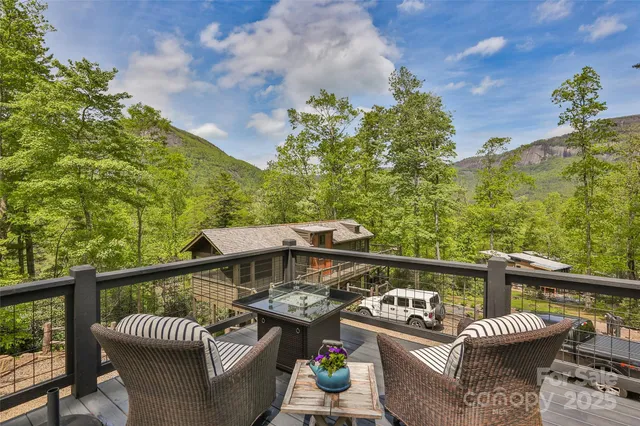a view of a roof deck with couches