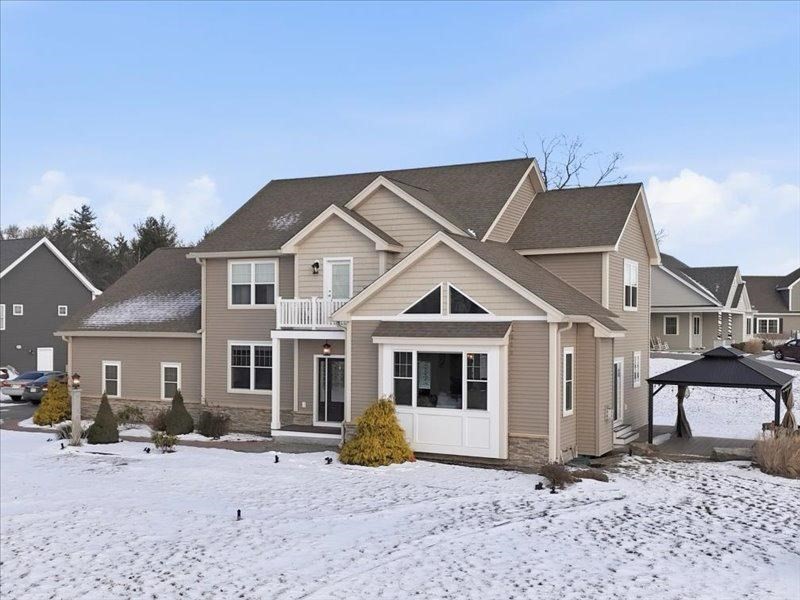 2 Aspen Drive Pelham, NH 03076 - Photo 2 of 42 a front view of a house with a yard