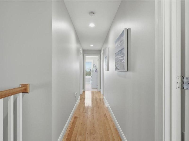 2 Aspen Drive Pelham, NH 03076 - Photo 25 of 42 a view of a hallway with wooden floor