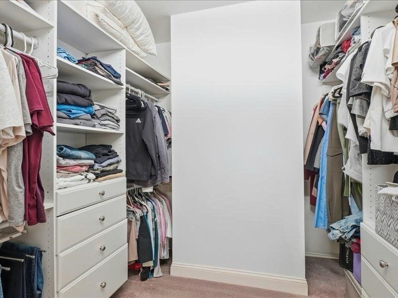 2 Aspen Drive Pelham, NH 03076 - Photo 29 of 42 a view of walk in closet with clothes
