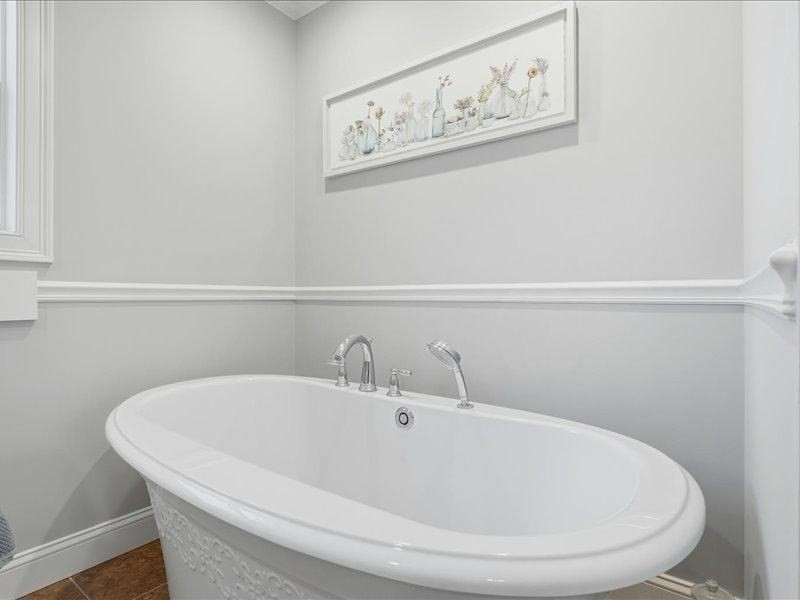 2 Aspen Drive Pelham, NH 03076 - Photo 31 of 42 a white bath tub sitting next to a white sink and vanity