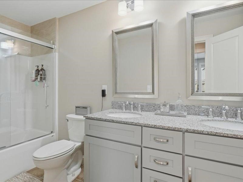 2 Aspen Drive Pelham, NH 03076 - Photo 36 of 42 a bathroom with a granite countertop toilet sink and mirror