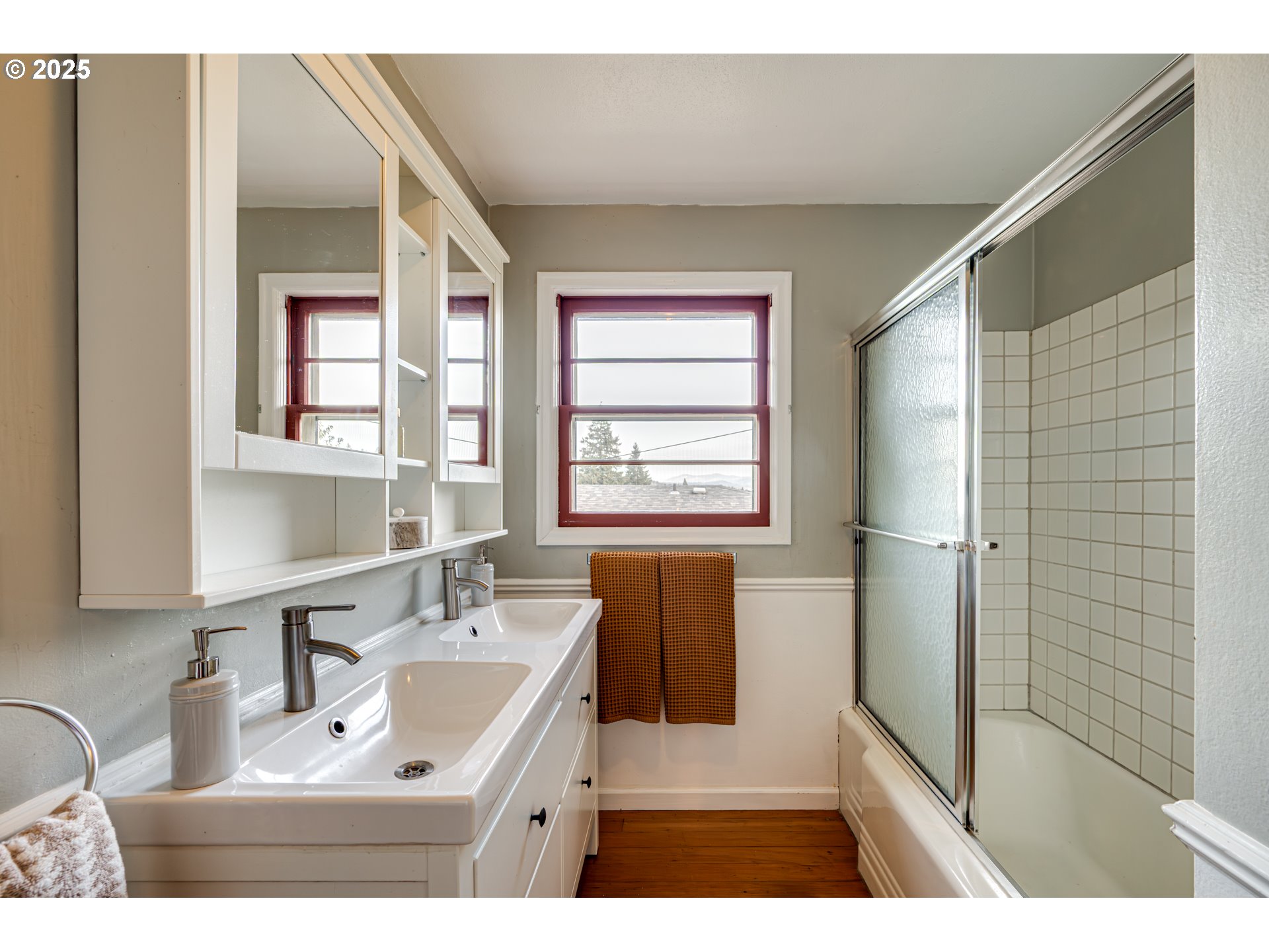 222 Northwest 19th Avenue Camas, WA 98607 - Photo 15 of 42 a bathroom with a sink mirror and a bathtub