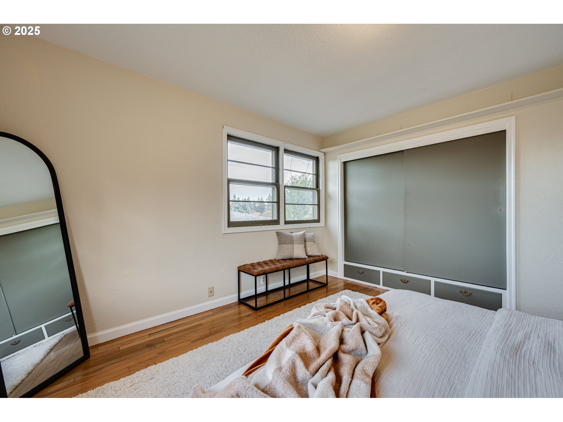 222 Northwest 19th Avenue Camas, WA 98607 - Photo 17 of 42 a bedroom with a bed and a window