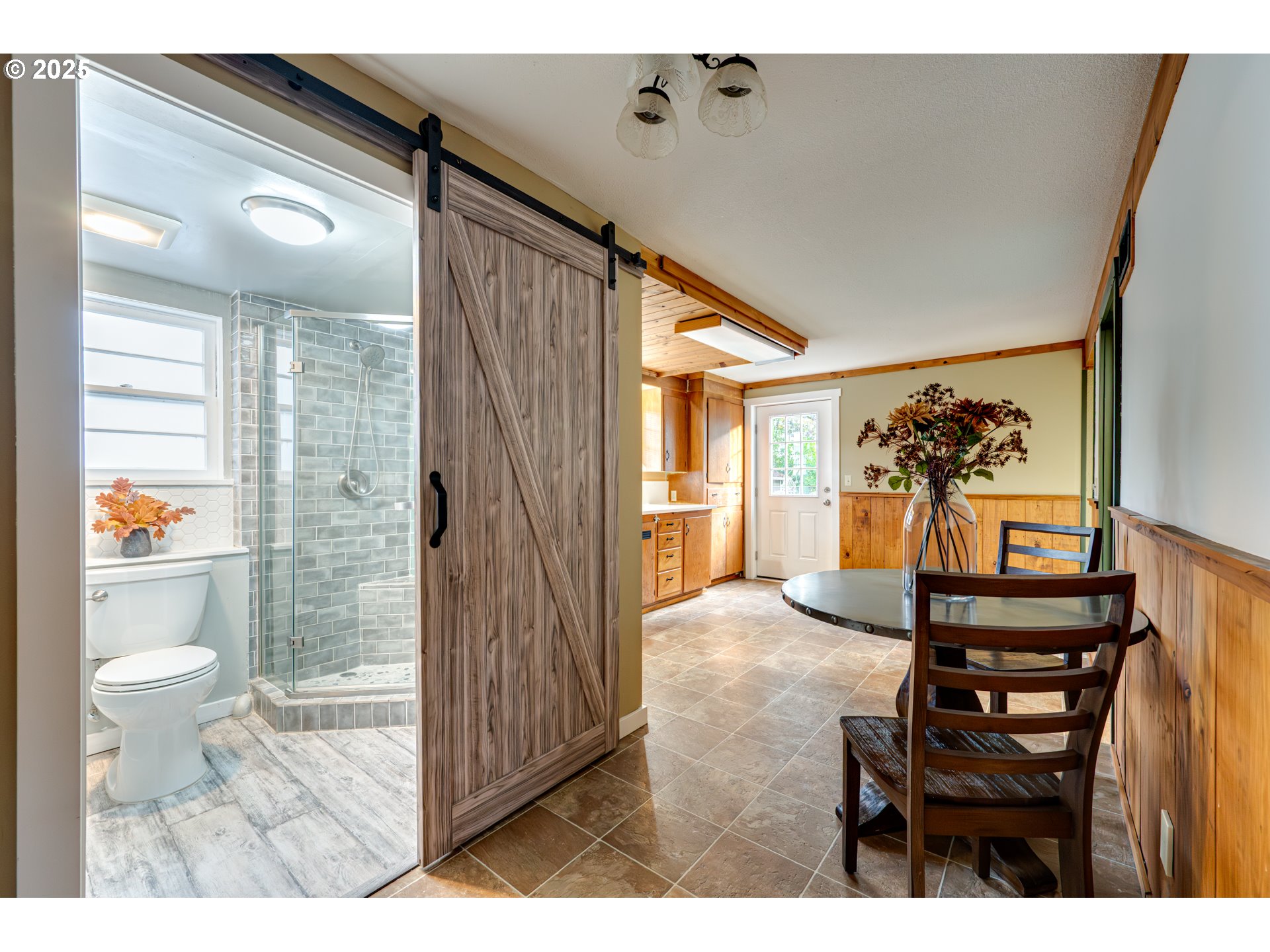 222 Northwest 19th Avenue Camas, WA 98607 - Photo 22 of 42 a view of a hallway with wooden floor and furniture