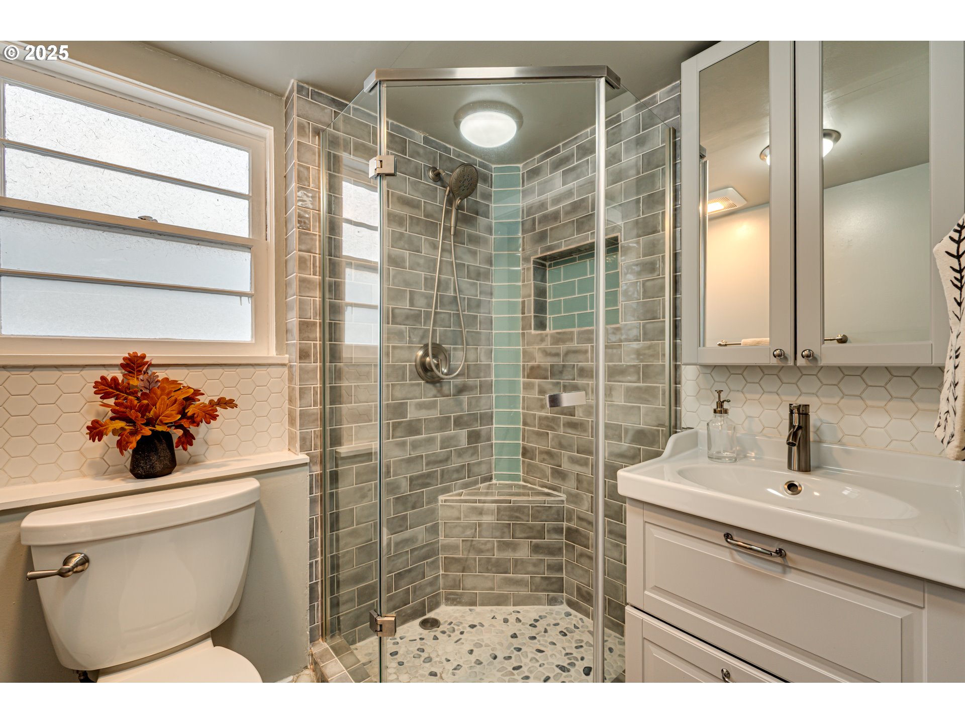 222 Northwest 19th Avenue Camas, WA 98607 - Photo 23 of 42 a bathroom with a toilet sink vanity and mirror