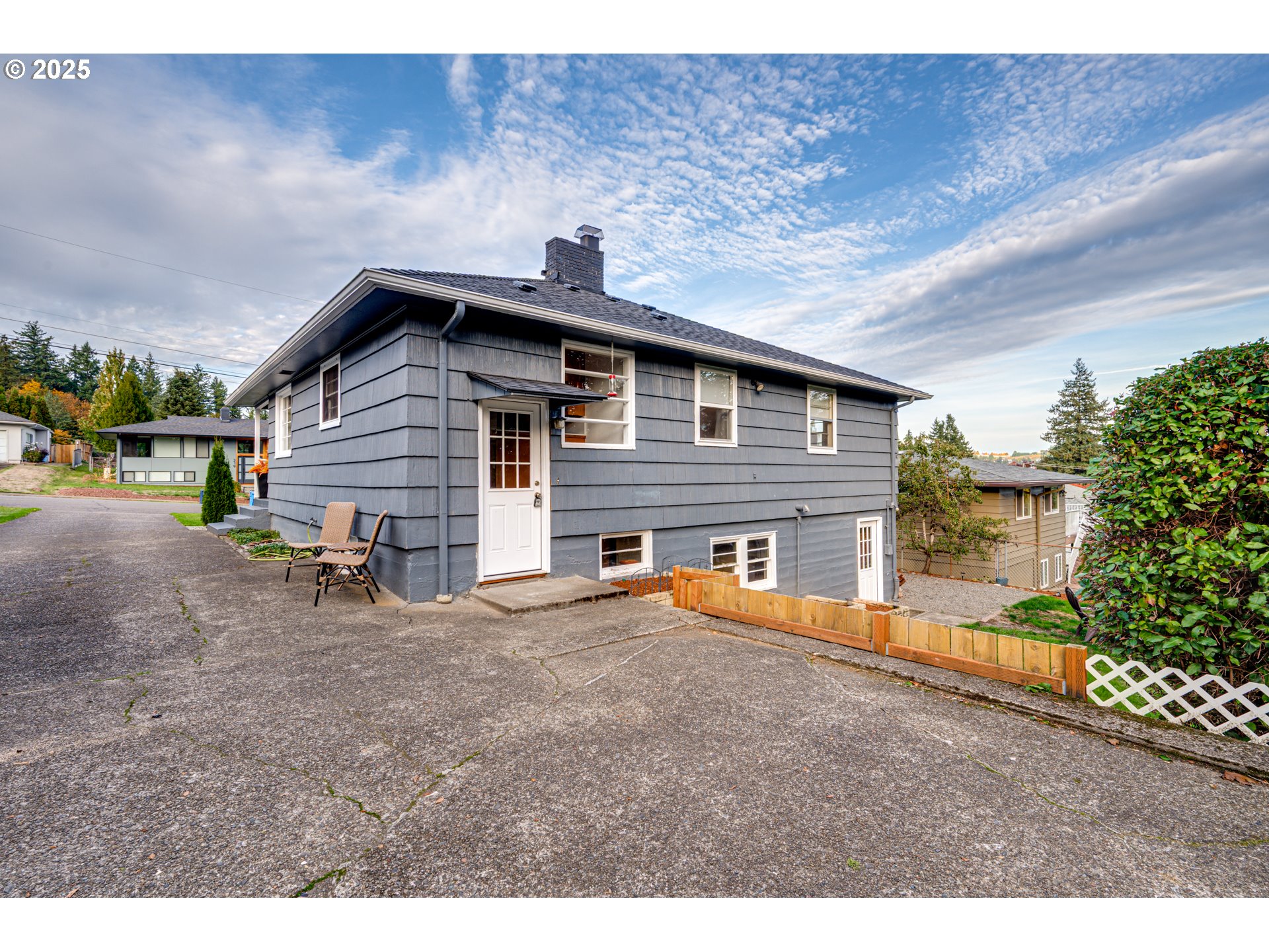 222 Northwest 19th Avenue Camas, WA 98607 - Photo 29 of 42 a view of a house with a yard and sitting area