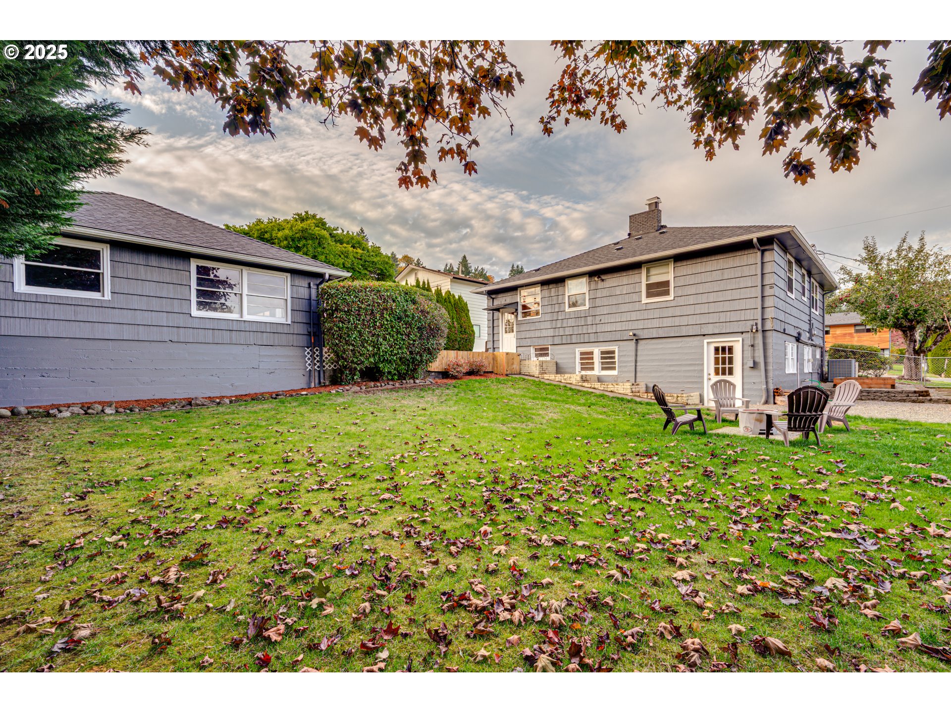 222 Northwest 19th Avenue Camas, WA 98607 - Photo 30 of 42 a view of a house with a big yard potted plants and large tree