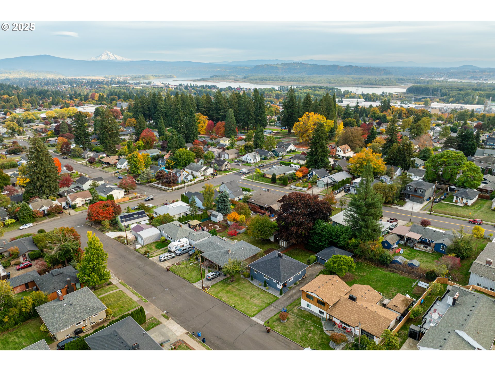 222 Northwest 19th Avenue Camas, WA 98607 - Photo 36 of 42 an aerial view of a city with lots of residential buildings ocean and mountain view in back