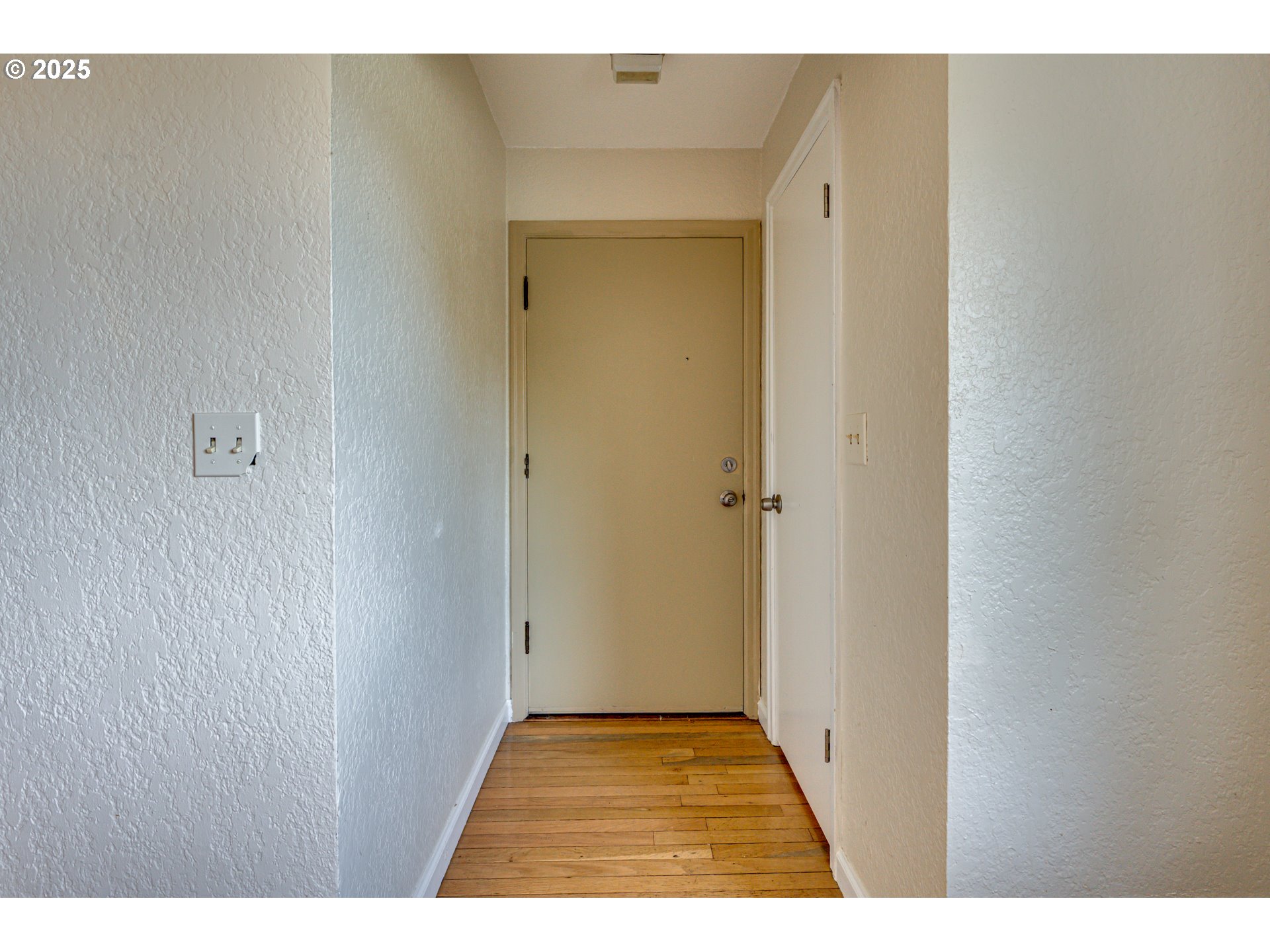 222 Northwest 19th Avenue Camas, WA 98607 - Photo 5 of 42 a view of an empty room with wooden floor