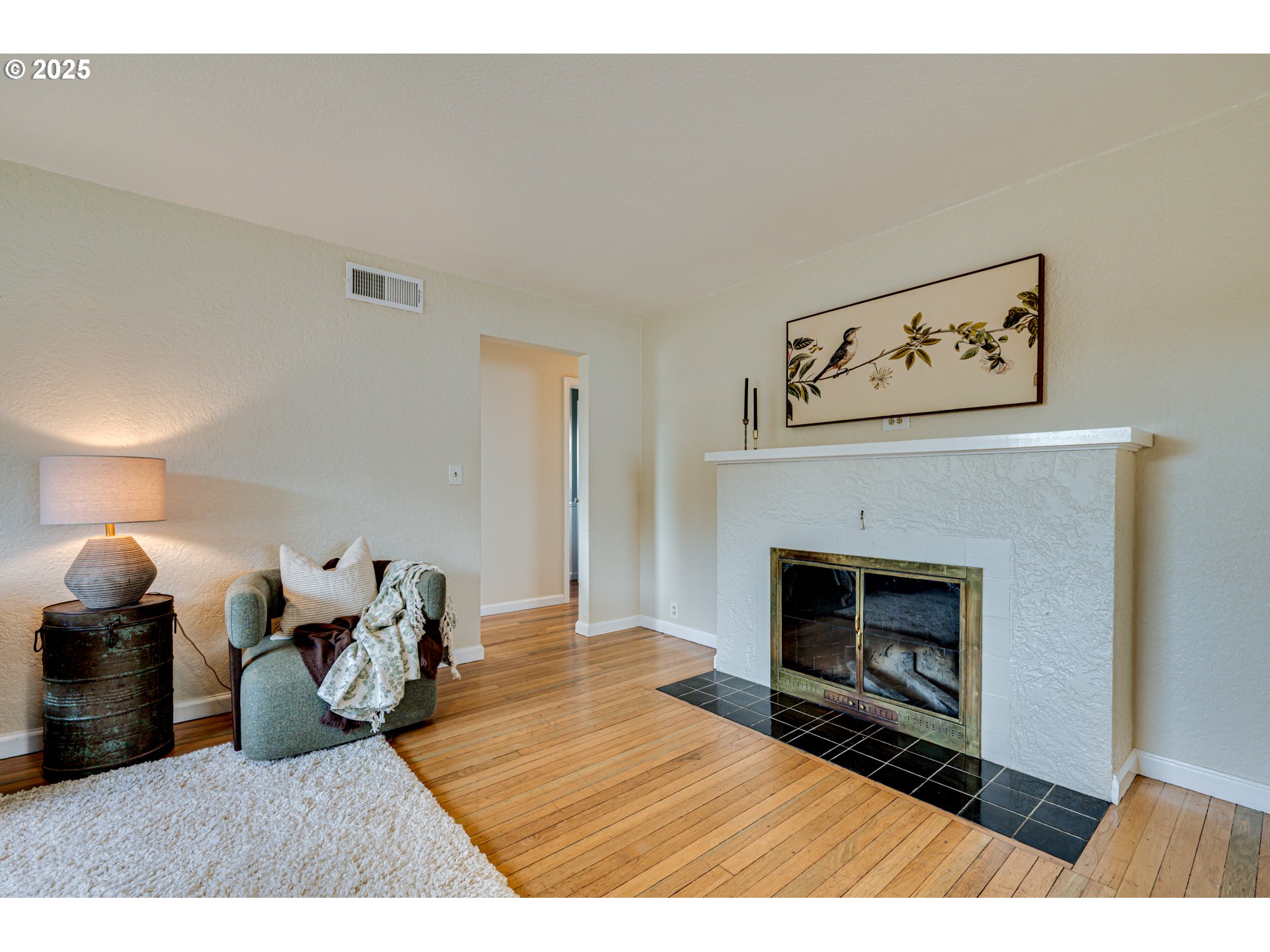222 Northwest 19th Avenue Camas, WA 98607 - Photo 6 of 42 a living room with furniture and a fireplace