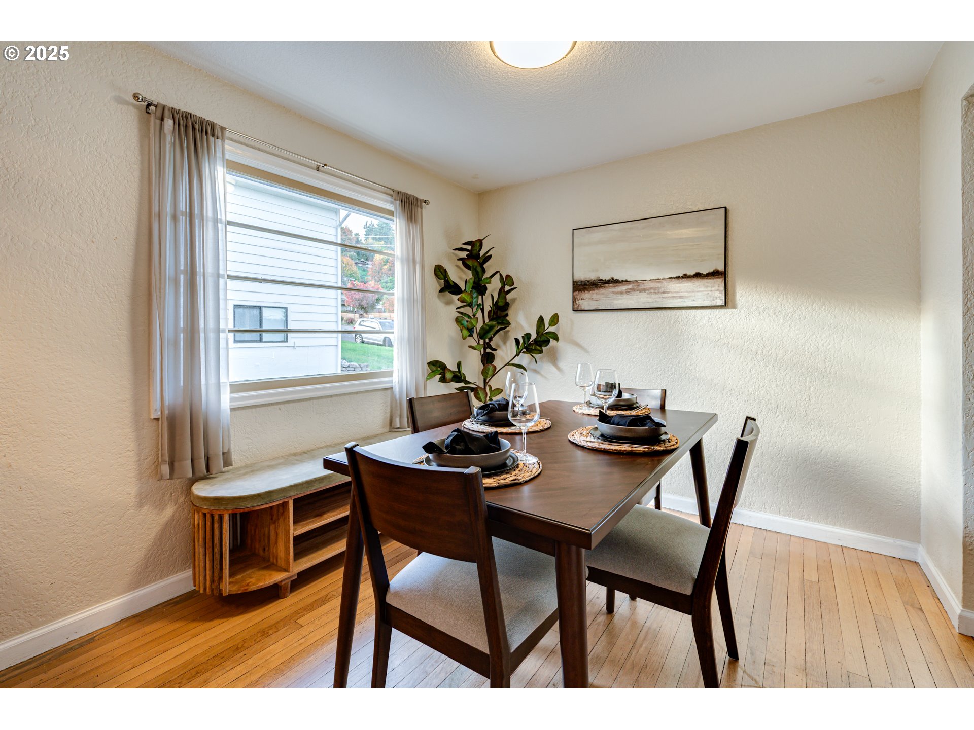 222 Northwest 19th Avenue Camas, WA 98607 - Photo 9 of 42 a view of a dining room with furniture and window