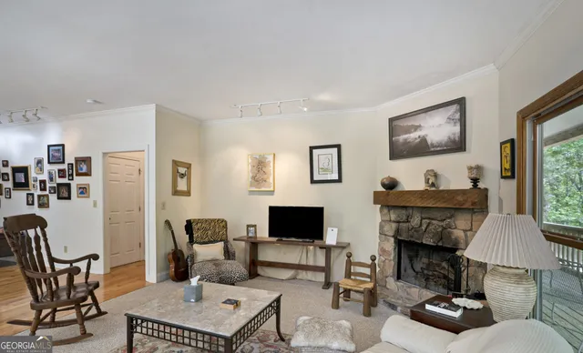 a view of a city from a dining room with furniture