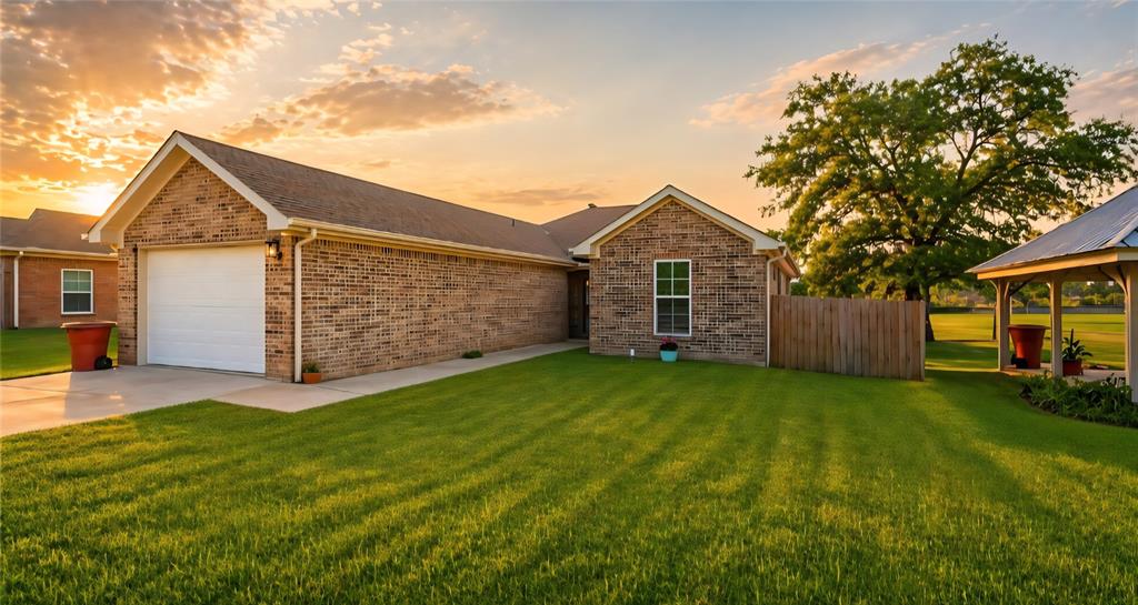 front view of a house with a yard